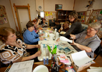 group of elderly busy performing activity